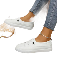 White slip-on sneakers.
