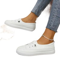 White slip-on sneakers.