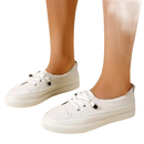 White lace-up sneakers.