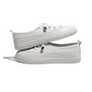Stacked white sneakers.