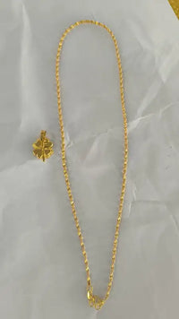 Golden Wave Pendant Necklace