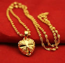 Golden Wave Pendant Necklace - Doublesided heart necklace