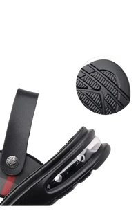Black sandal with air cushion bottom.