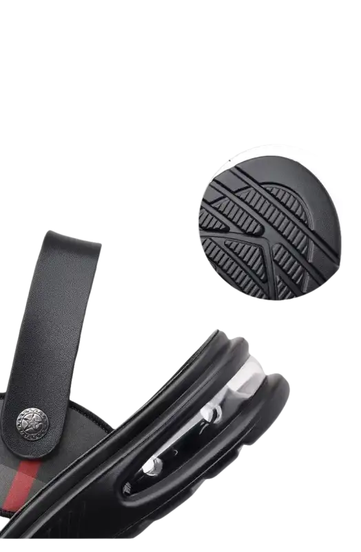 Black sandal with air cushion bottom.