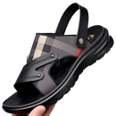 Plaid and black leather sandal.
