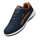 Navy and tan leather sneaker.
