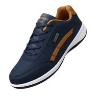 Navy and tan leather sneaker.