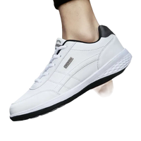 White leather sneaker with black accents.