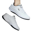 White leather sneakers with black trim.