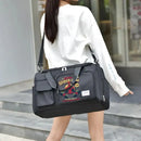 Black duffel bag with Spider-Man graphic.