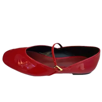 Red patent leather Mary Jane flat.
