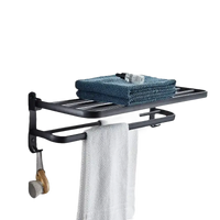 Black metal bathroom towel rack.