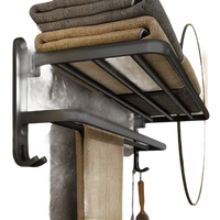 Black metal towel rack with shelf and hooks.