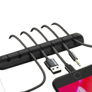 Black cable organizer with multiple slots.