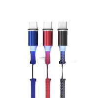 Cable organizer with three charging cables.