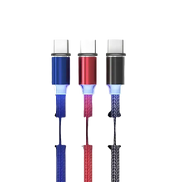 Cable organizer with three charging cables.