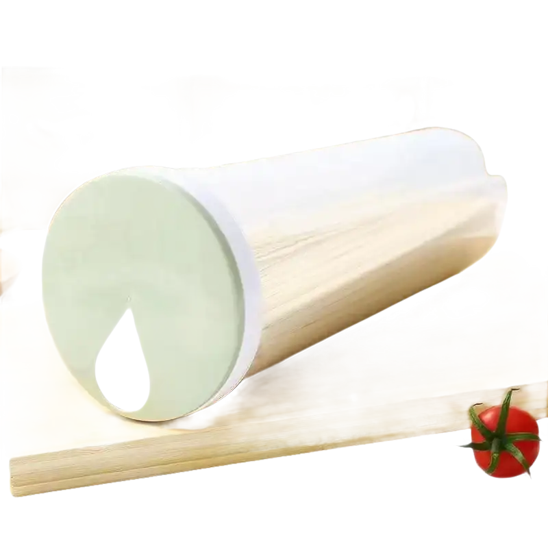 Cylindrical pasta container with a light green lid.