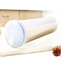Cylindrical pasta container with light blue lid.