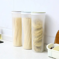 Pasta in cylindrical containers.