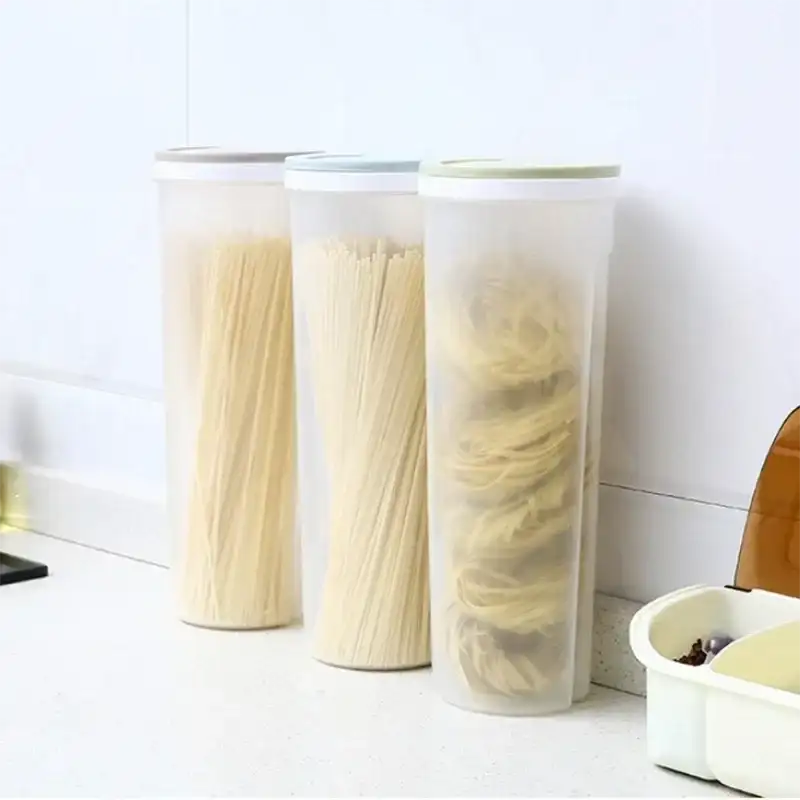 Pasta in cylindrical containers.