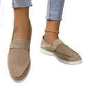 Beige suede loafers.