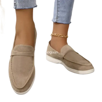 Beige suede loafers.