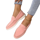 Pink slip-on loafers.