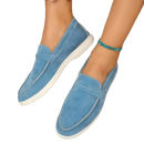 Blue suede loafers.