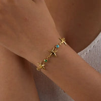 Starfish Elegance: Gold Zircon Titanium Bracelet - JDB0203013