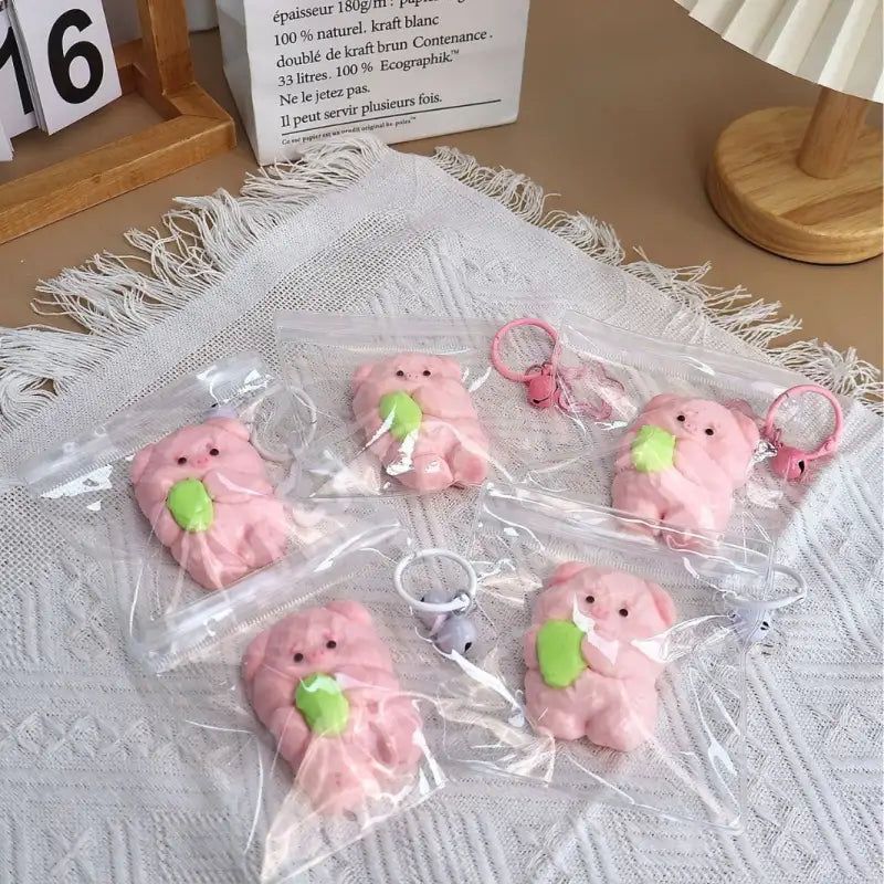 Oinktastic SqueezeEase Piggy Platoon edible silicone toy