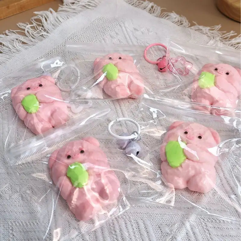 Oinktastic SqueezeEase Piggy Platoon edible silicone toy
