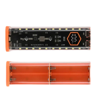 Orange and clear battery-powered LED light.