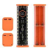 Orange battery charger with digital display.