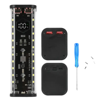 Rectangular power bank with LED display and ports.