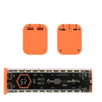 Orange power bank with multiple ports and digital display.