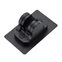 Black adhesive shower head holder from Our Sweet Black Ventouse Noire Support Mural Selection, trendy and adjustable support mural réglable