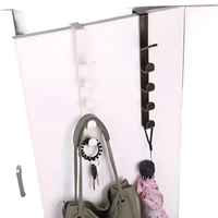 Over-the-door hooks for storage.