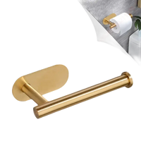 Gold-colored toilet paper holder with dimensions.