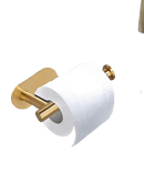 Gold-toned toilet paper holder with white roll.