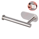 Stainless steel toilet paper holder with adhesive backing.
