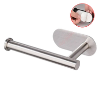 Stainless steel toilet paper holder with adhesive backing.