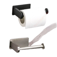 Two wall-mounted toilet paper holders.
