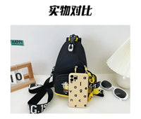 Black sling bag with yellow accents.