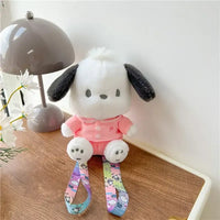 Pochacco plush toy in pink pajamas.