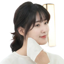 Woman wiping face with white cloth.