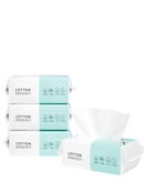 Stacked packages of cotton face towels.