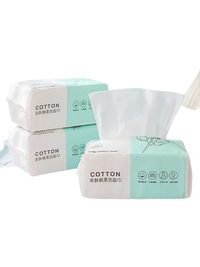 Stacked packages of cotton facial tissues.
