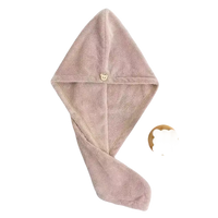 Pink towel hair wrap.
