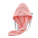 Pink hooded hair towel.