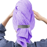 Purple waffle-weave hair towel.